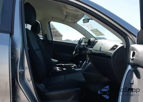 2014 Mazda Cx-5 Sport z USA, uszkodzony, nr VIN JM3KE4BE9E0402463